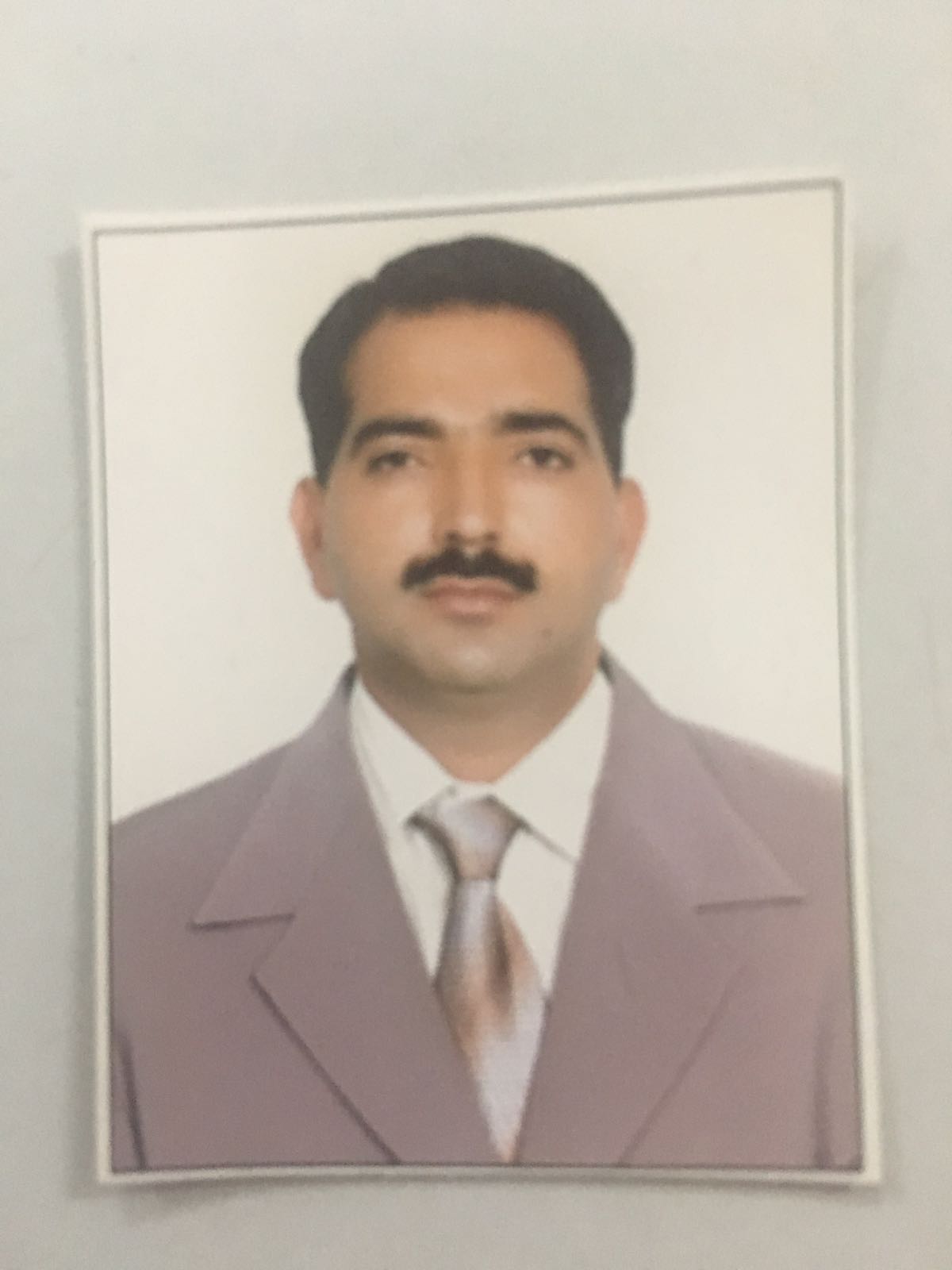 Chemistry professor conducting laboratory research